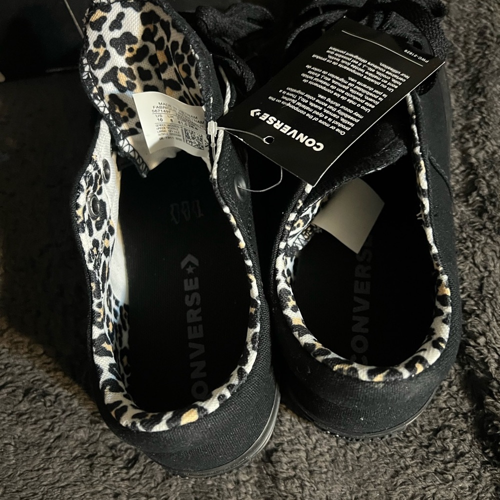 Converse Black Sneakers with Bold Design